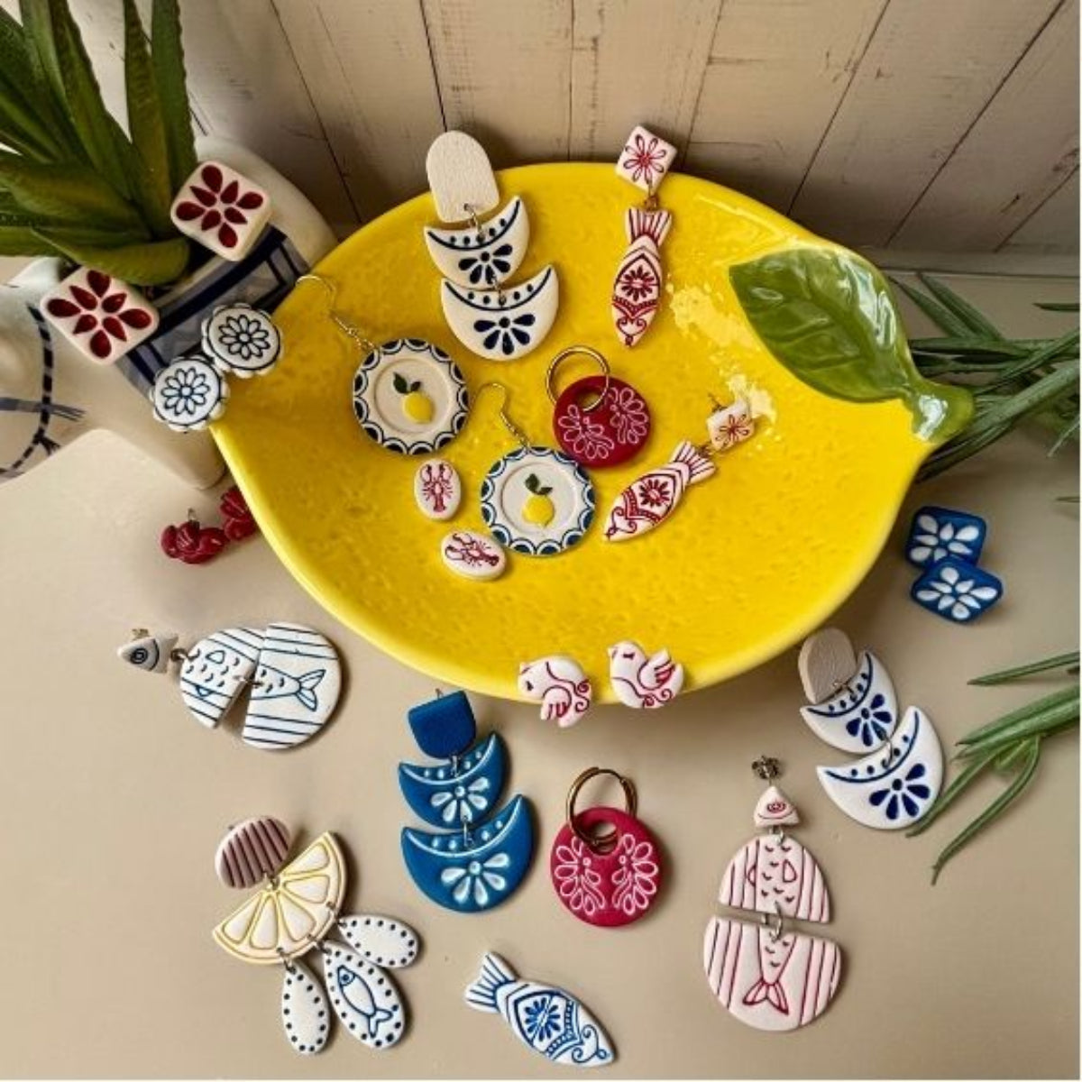 The Aegean Collection of handmade Mediterranean-inspired polymer clay earrings by Little Lis Studio.