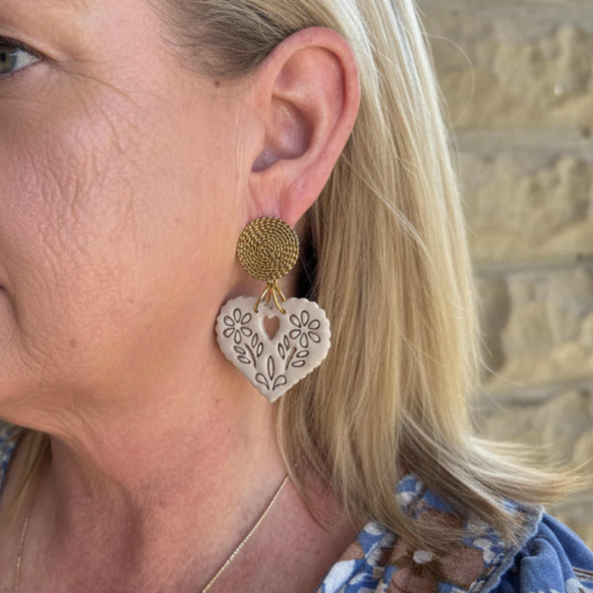 Amore statement Papel picado heart earring in a linen beige colour, handmade from polymer clay by Little Lis Studio on siler or gold textured stud