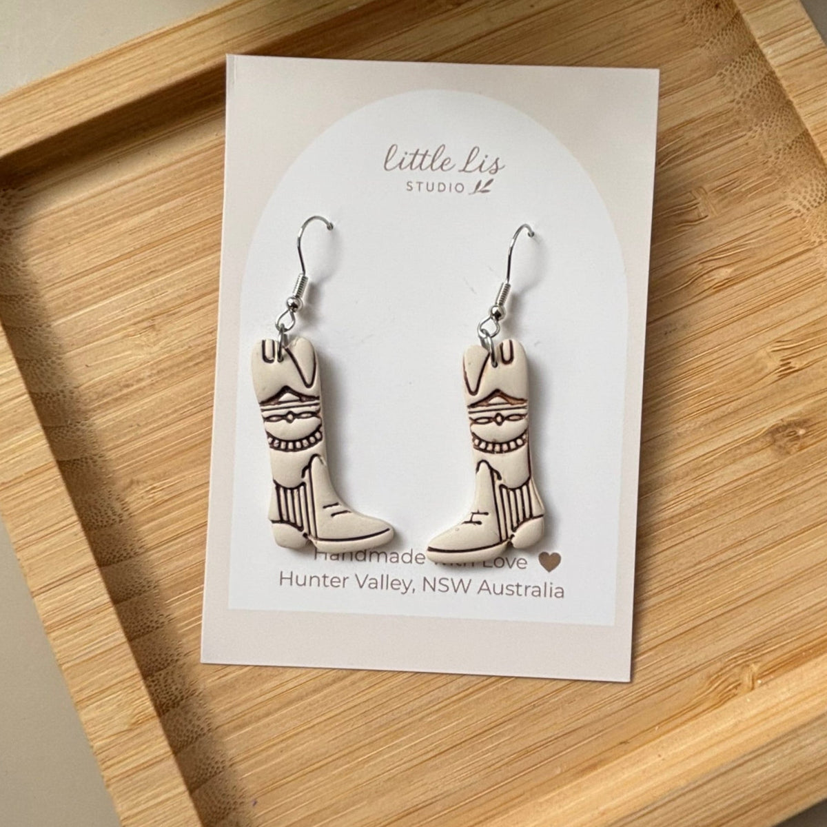 Dusty Boots handmade western cowboy boot polymer clay earrings by Little Lis Studio.
