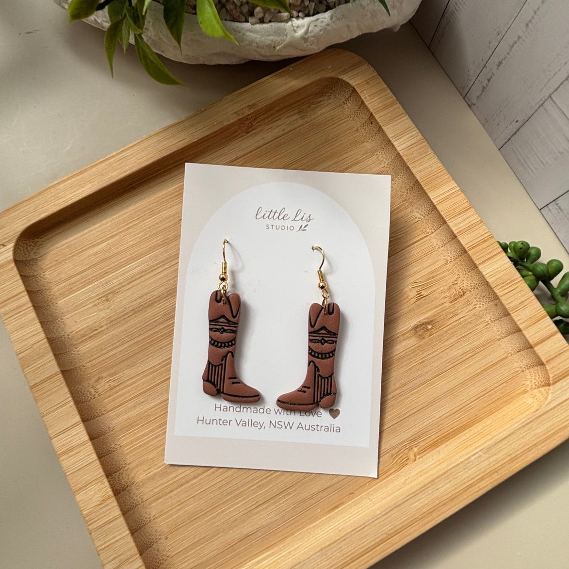 Dusty Boots handmade western cowboy boot polymer clay earrings by Little Lis Studio.