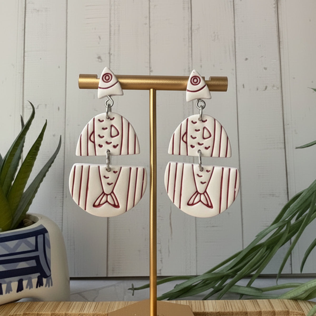 Handmade Santorini Sardines Mediterranean fish statement earrings in white and red by Little Lis Studio.
