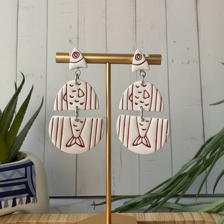 Handmade Santorini Sardines Mediterranean fish statement earrings in white and red by Little Lis Studio.