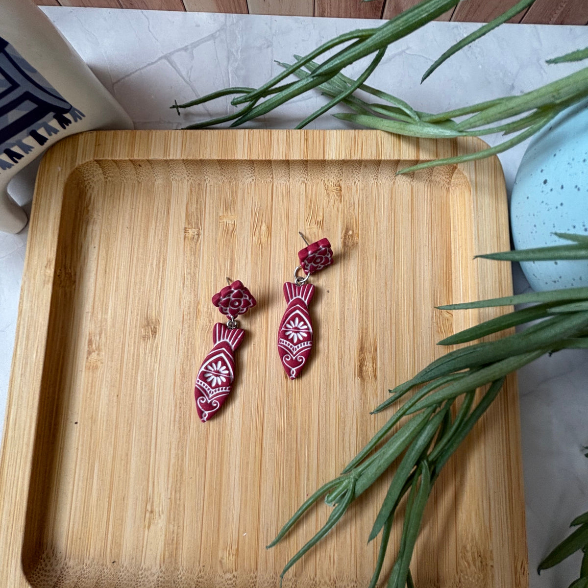 Handmade Kyma Fish polymer clay dangle earrings with Mediterranean-inspired detailing  in Red / White