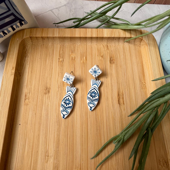 Handmade Kyma Fish polymer clay dangle earrings with Mediterranean-inspired detailing in White / Cobalt blue