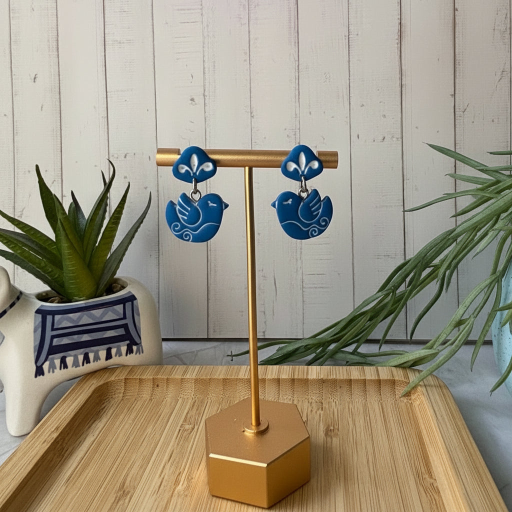 Handmade Nisi Bird Mediterranean polymer clay dangle earrings in cobalt blue by Little Lis Studio.