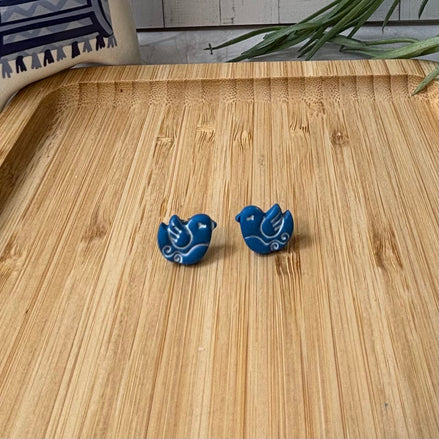 Handmade Nisi Bird Mediterranean polymer clay stud earrings in cobalt blue and white by Little Lis Studio.