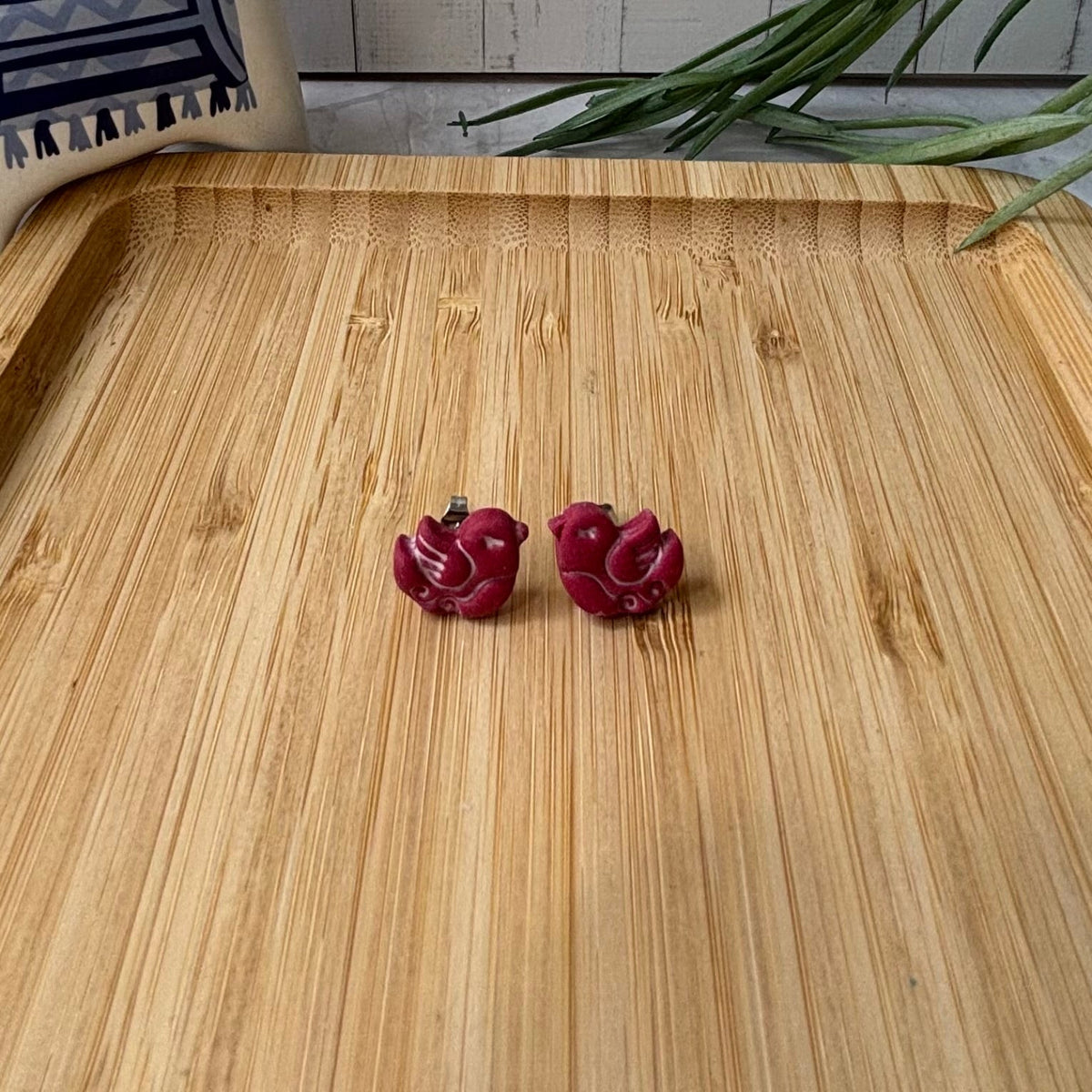 Handmade Nisi Bird Mediterranean polymer clay stud earrings in red and white by Little Lis Studio.