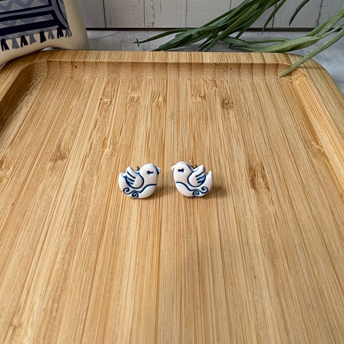 Handmade Nisi Bird Mediterranean polymer clay stud earrings in white land blue by Little Lis Studio