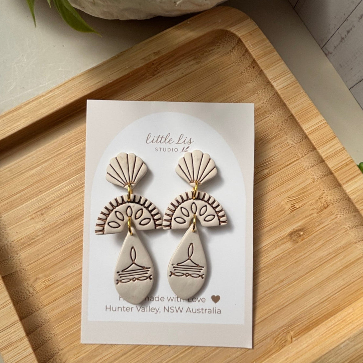 Prairie statement dangle earrings in ivory with brown inlay part of the boots and blooms collection by Little Lis Studio
