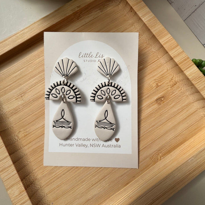 Prairie statement dangle earrings in ivory with lack inlay part of the boots and blooms collection by Little Lis Studio
