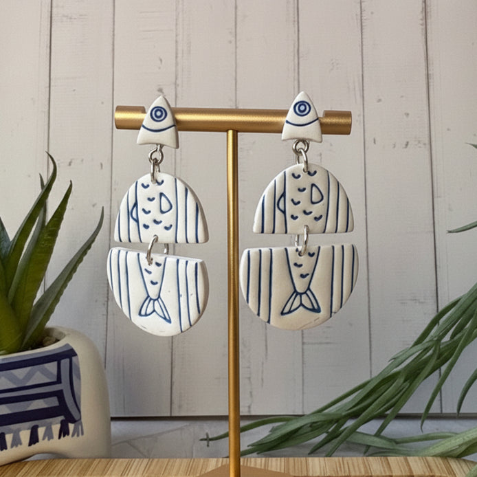 Handmade Santorini Sardines Mediterranean fish statement earrings in white and cobalt blue by Little Lis Studio.