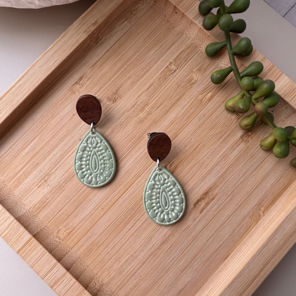 Willow western teardrop polymer clay earrings with timber-look tops by Little Lis Studio.