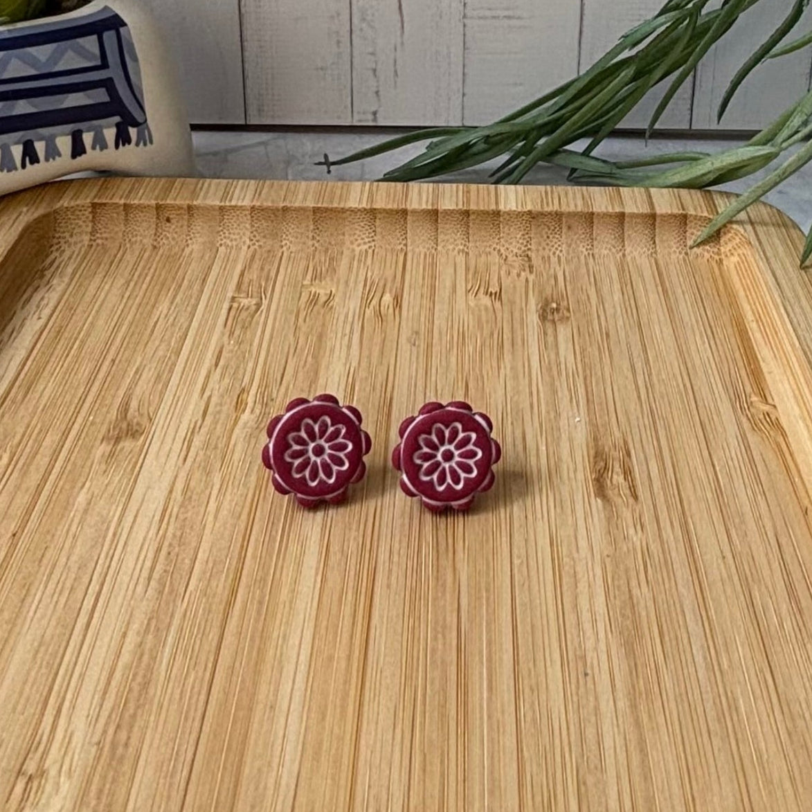 Handmade Zorba scalloped floral polymer clay stud earrings in red and white from the Little Lis Studio Aegean Collection.
