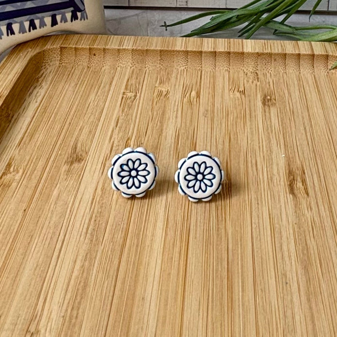 Handmade Zorba scalloped floral polymer clay stud earrings in white and cobalt blue from the Little Lis Studio Aegean Collection.