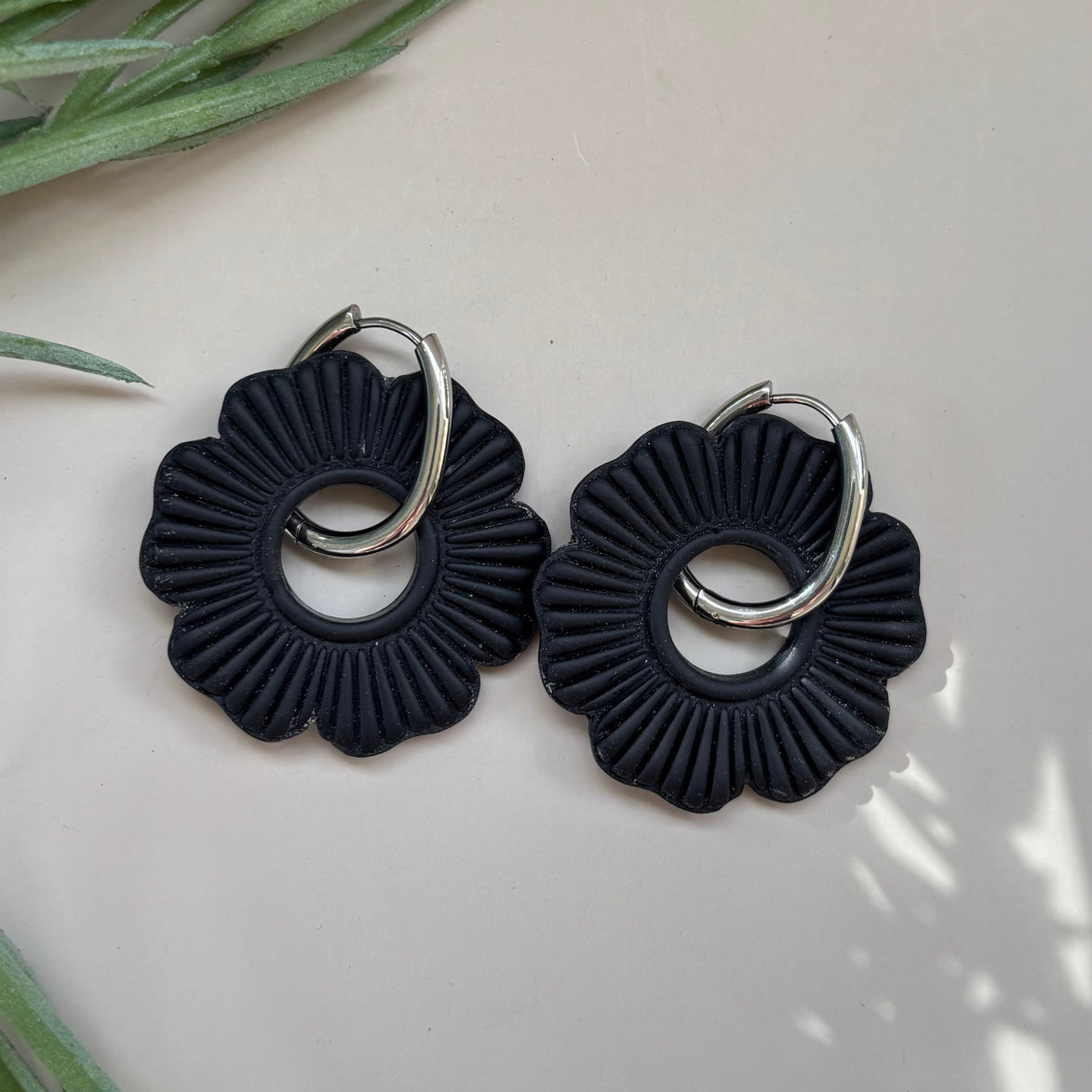 Black hoop earrings on a 18mm oval shaped hoop