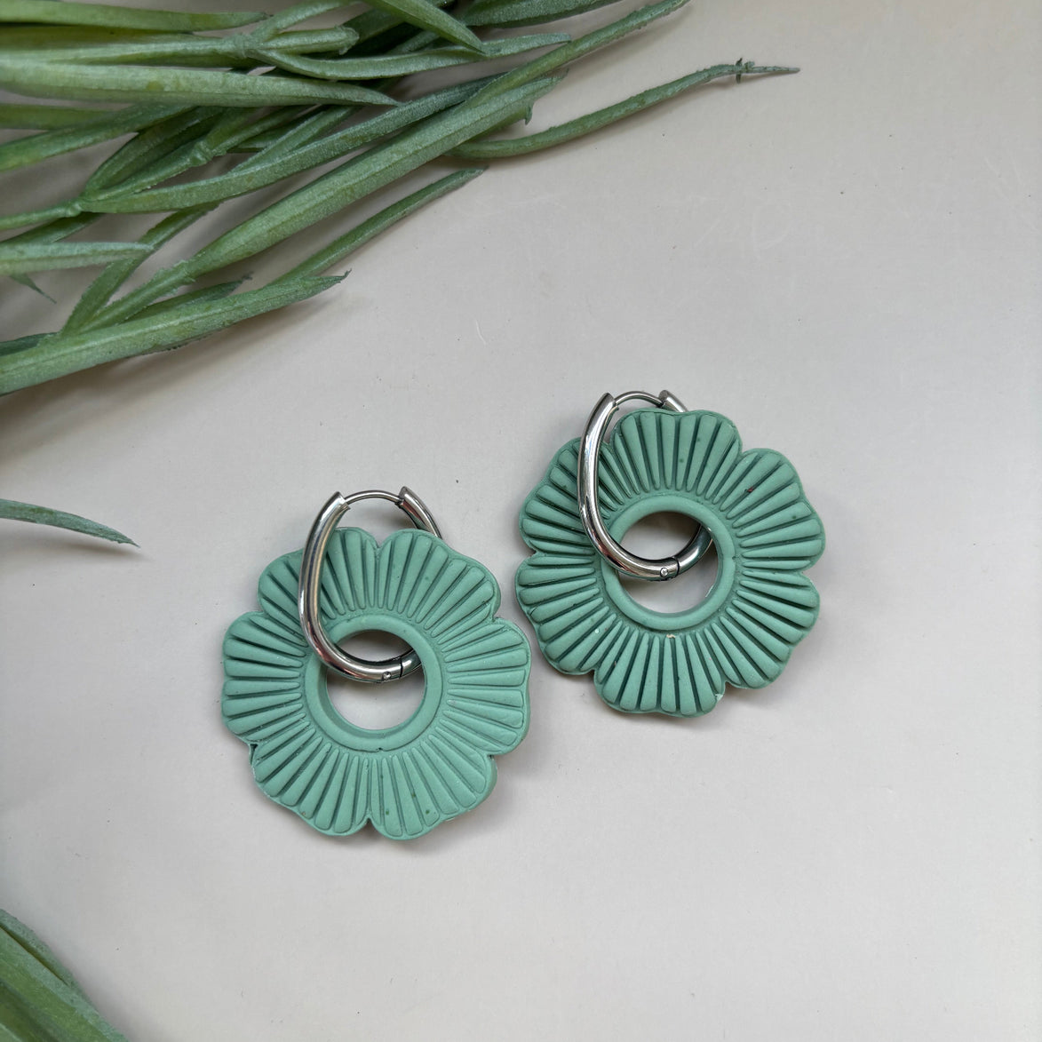 Fern green flower shaped drop earrings on 18mm silver hoop
